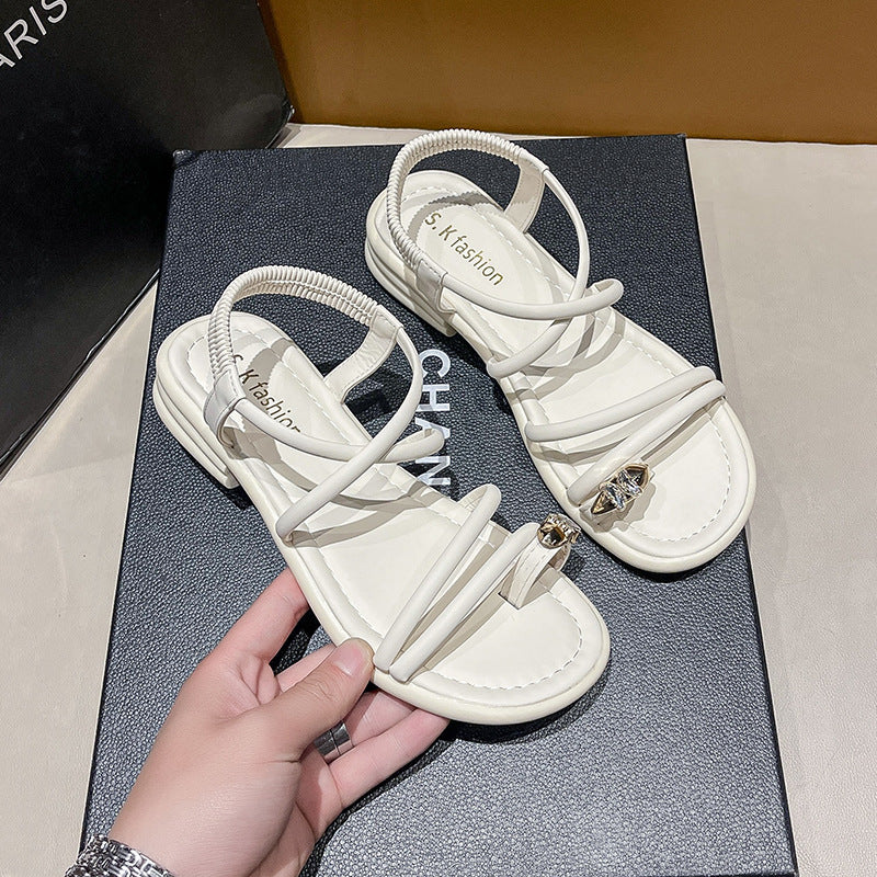 Damen Flache Riemchensandalen mit Zehensteg, elastischem Fersenriemen und Schmuckapplikation Shop Nory