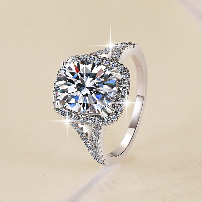 Damen Verlobungsring mit elegantem facettiertem Hauptstein und funkelndem Zirkonia-Besatz Shop Nory