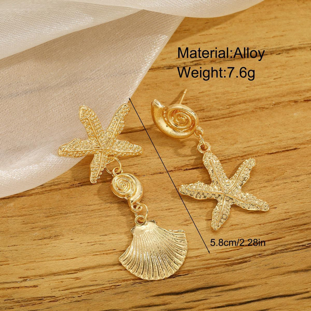 Damen Ohrringe mit maritimem Muschelmotiv und funkelnden Akzenten Shop Nory