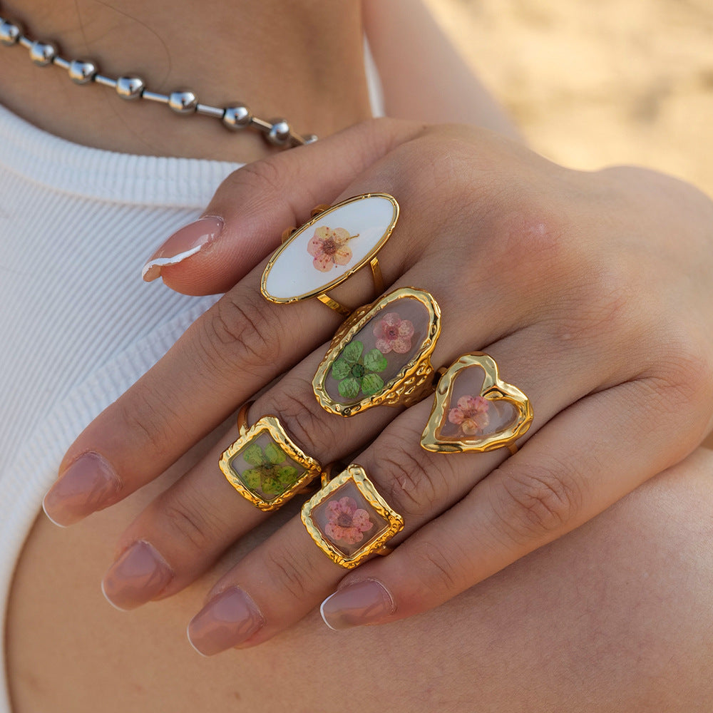 Damen Offener Ring mit charmanten floralen Motiven und hypoallergener Edelstahlverarbeitung Shop Nory