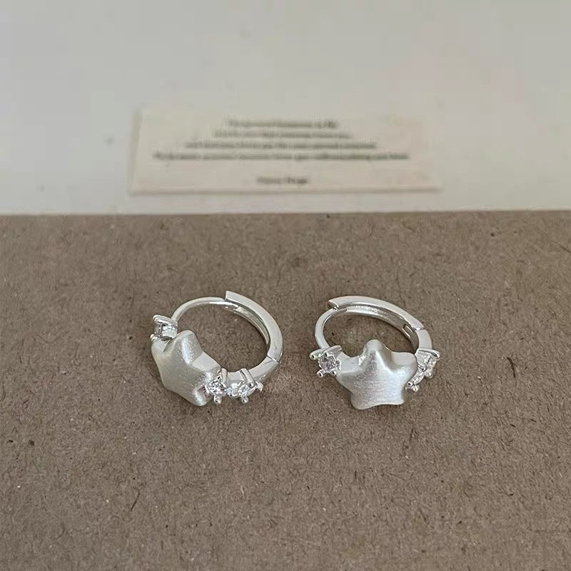 Damen Ring mit funkelndem Stern und eleganten Ziersteinen Shop Nory