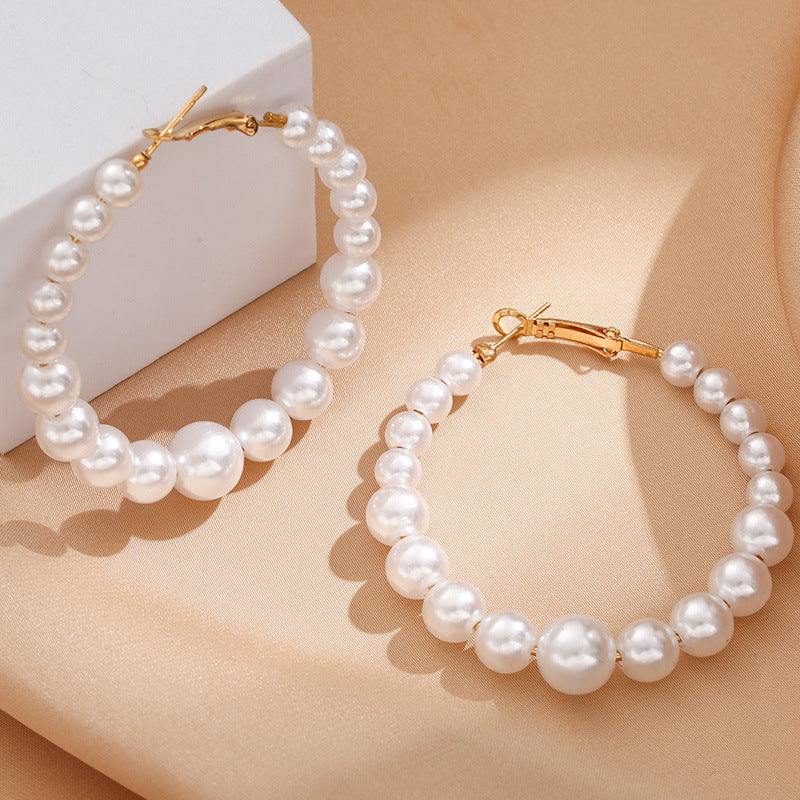 Damen Creolen mit luxuriösen Perlen und goldenen Akzenten Shop Nory