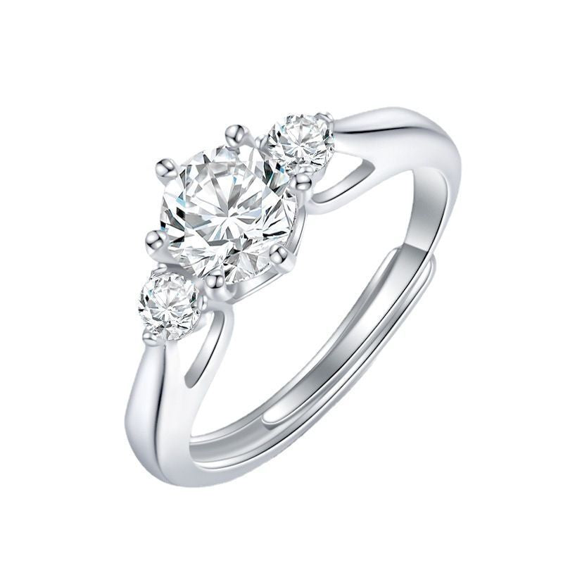 Damen eleganter Ring mit funkelndem Solitär und verspieltem Zirkonia-Besatz Shop Nory