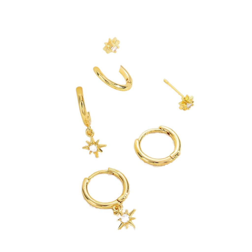 Damen Ohrschmuck mit funkelndem Sternanhänger und eleganten Creolen Shop Nory