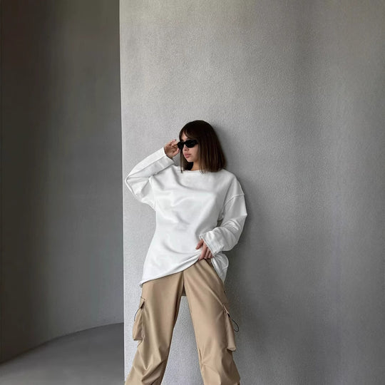 Damen oversized Sweatshirt mit ausgefranstem Saum und verlängerten Ärmeln Shop Nory