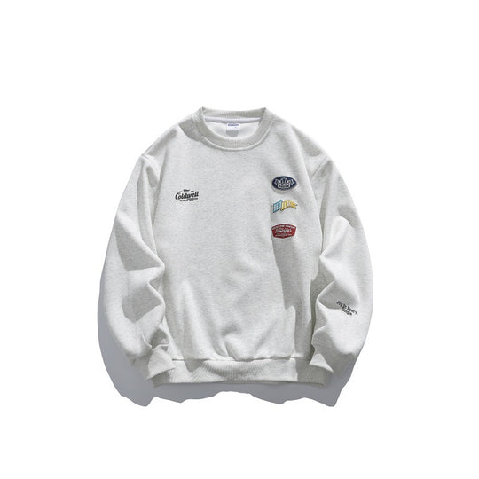 Unisex Oversize-Pullover mit Rundhalsausschnitt, Badge-Applikationen und gerippten Bündchen Shop Nory