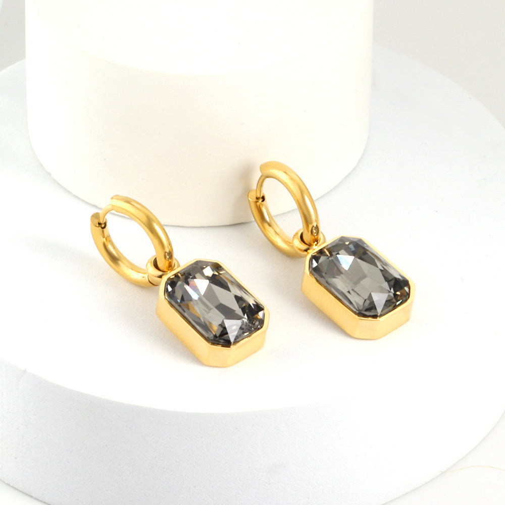 Damen Edelstahl Ohrhänger mit funkelnden Zirkonia und goldplattiertem Design Shop Nory