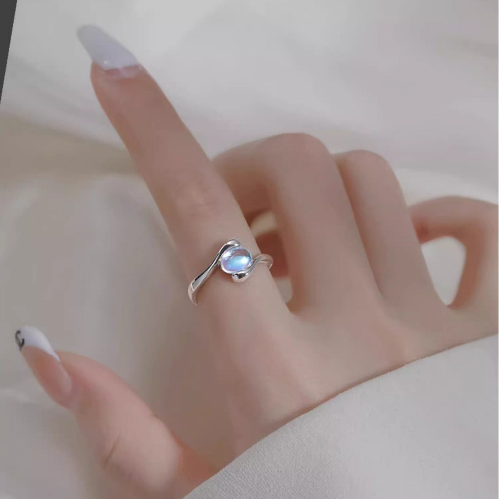 Damen zierlicher Ring mit eleganter Perle und geschwungenem Design Shop Nory
