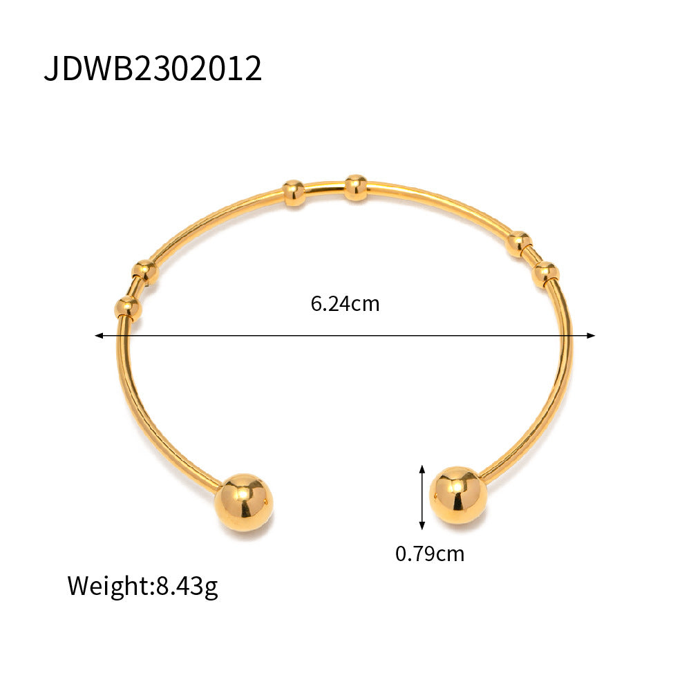 Damen Offenes Armreif mit elegantem Spiral-Design und Goldakzenten Shop Nory