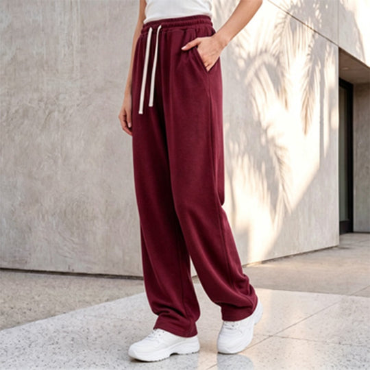 Damen nan weite Loungepalazzo-Hose mit hohem Komfortbund, Kordelzug, seitlichen Eingrifftaschen und dekorativer Seitennaht Shop Nory