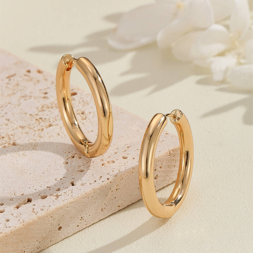 Damen Creolen mit modernem, geschwungenem Design Shop Nory