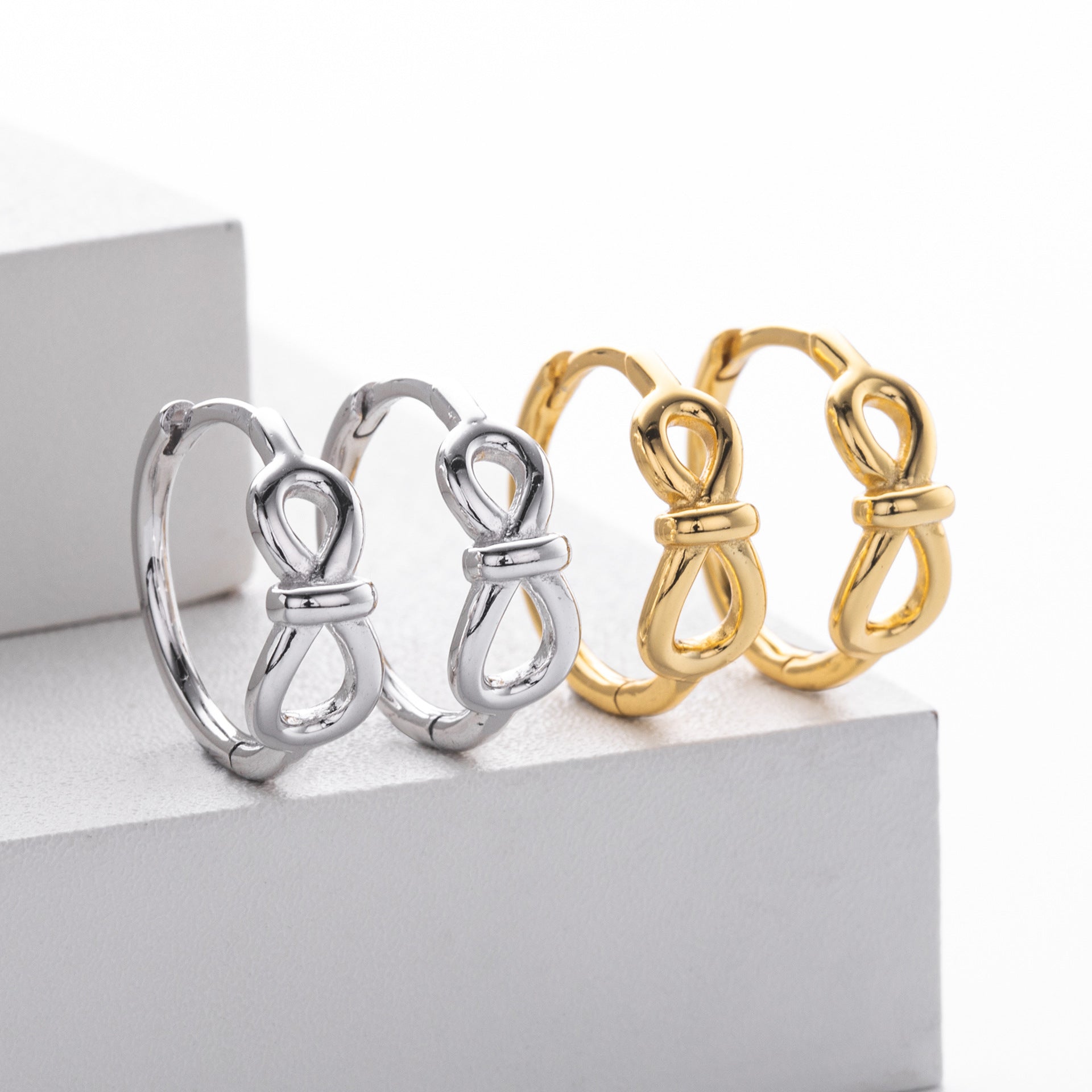 Damen Creolen mit verschlungenem Design Shop Nory