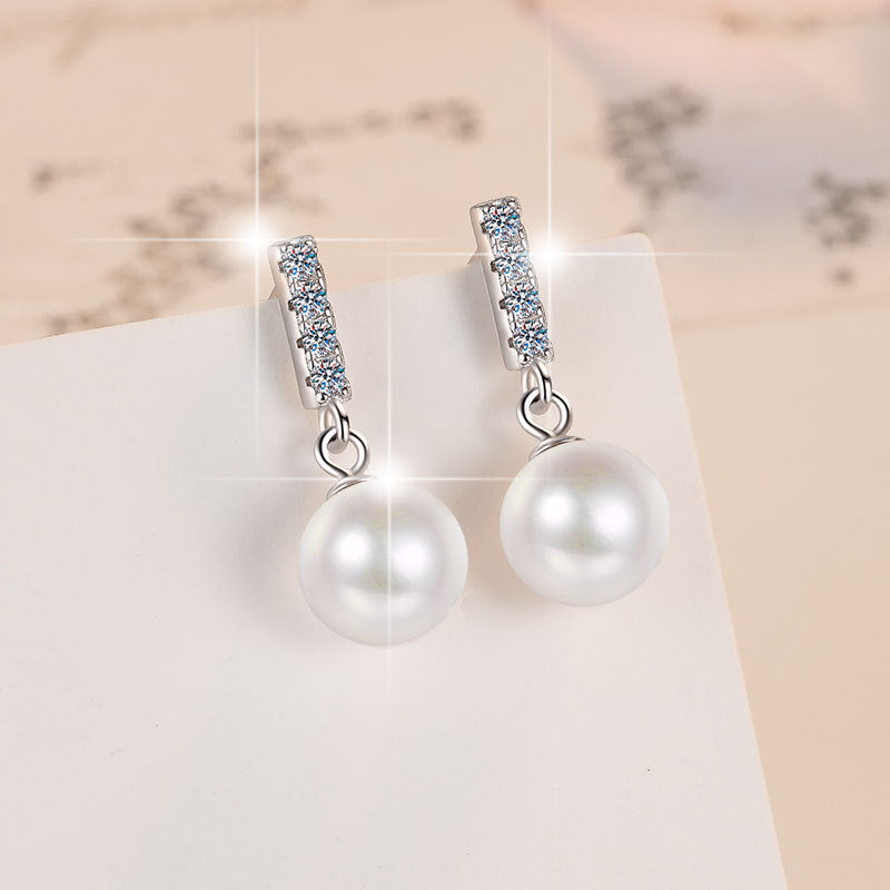 Damen Ohrstecker mit funkelndem Kristall und hochwertiger Perle Shop Nory