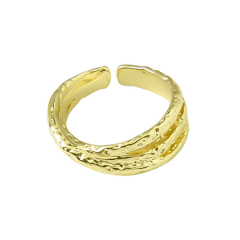 Damen eleganter Ring mit bewegtem Wellenmuster und funkelnden Akzenten Shop Nory