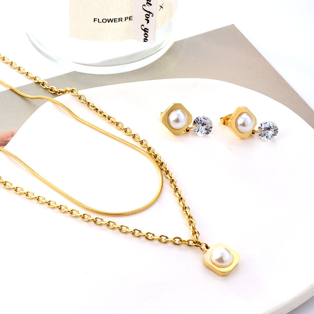 Damen Schmuckset mit modernem, eleganten Perlenanhänger und Ohrringen Shop Nory