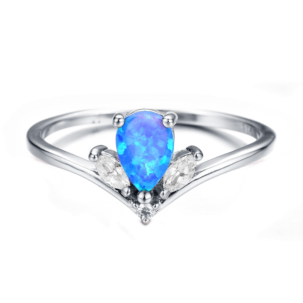 Damen Ring mit elegantem tropfenförmigem Opal und funkelnden Zirkonia Shop Nory