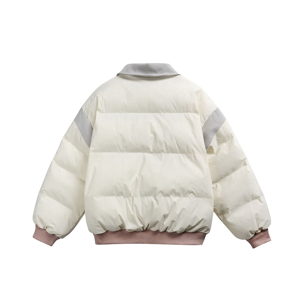Damen Kurz geschnittene wattierte Blousonjacke mit kontrastierendem Kragen und Stickdetails Shop Nory