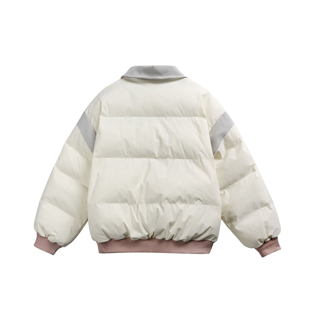 Damen Kurz geschnittene wattierte Blousonjacke mit kontrastierendem Kragen und Stickdetails Shop Nory