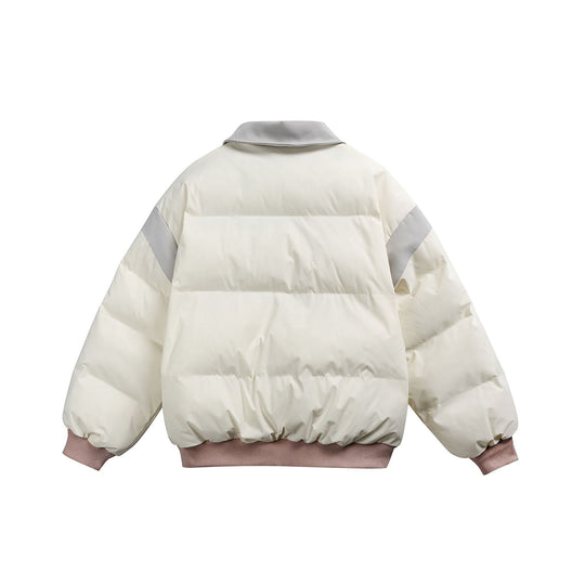 Damen Kurz geschnittene wattierte Blousonjacke mit kontrastierendem Kragen und Stickdetails Shop Nory