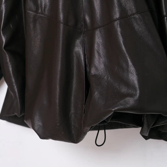 Damen Voluminöse Kunstleder-Capejacke mit hohem Stehkragen und Kordelzug Shop Nory