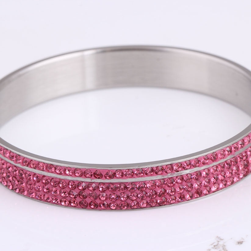 Damen Armreif mit funkelnden Zirkonia-Steinen und elegantem Design Shop Nory