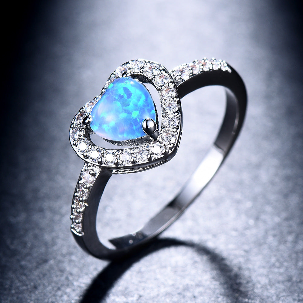 Damen Ring mit herzförmigem Opal und funkelnden Zirkonia-Verzierungen Shop Nory