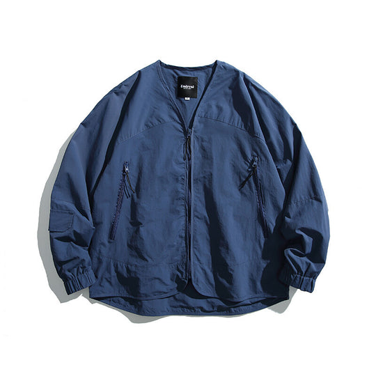Unisex Leichte Oversize‑Überhemdjacke aus technischem Nylonmix mit V‑Ausschnitt und Reißverschlusstaschen Shop Nory