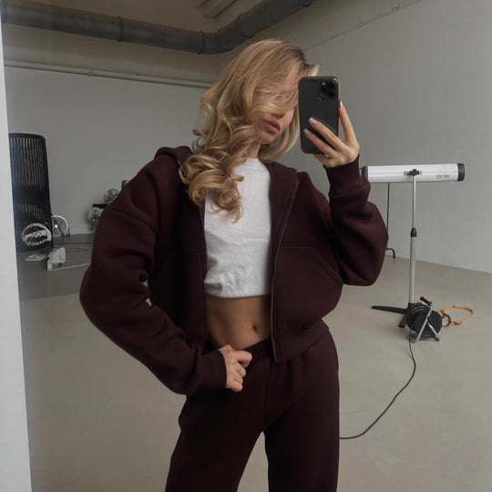 Damen Cropped Kapuzen-Sweatjacke mit Kängurutasche und tailliertem Rippbund Shop Nory
