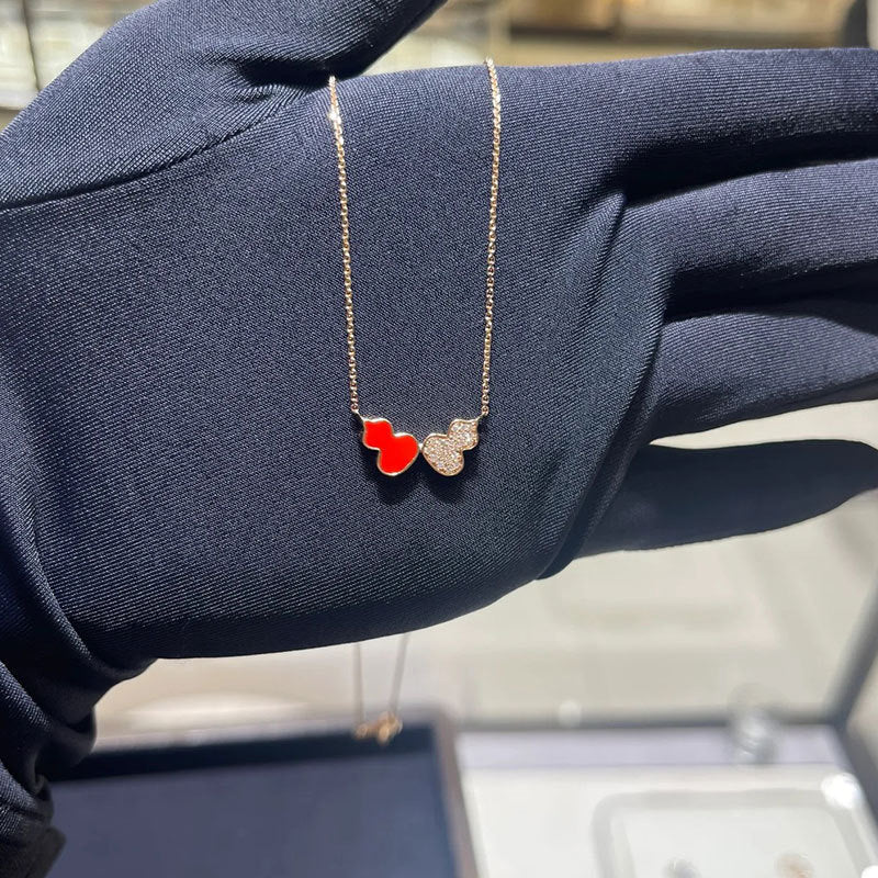 Damen Halskette mit doppeltem Anhänger und funkelnden Zirkonia Shop Nory