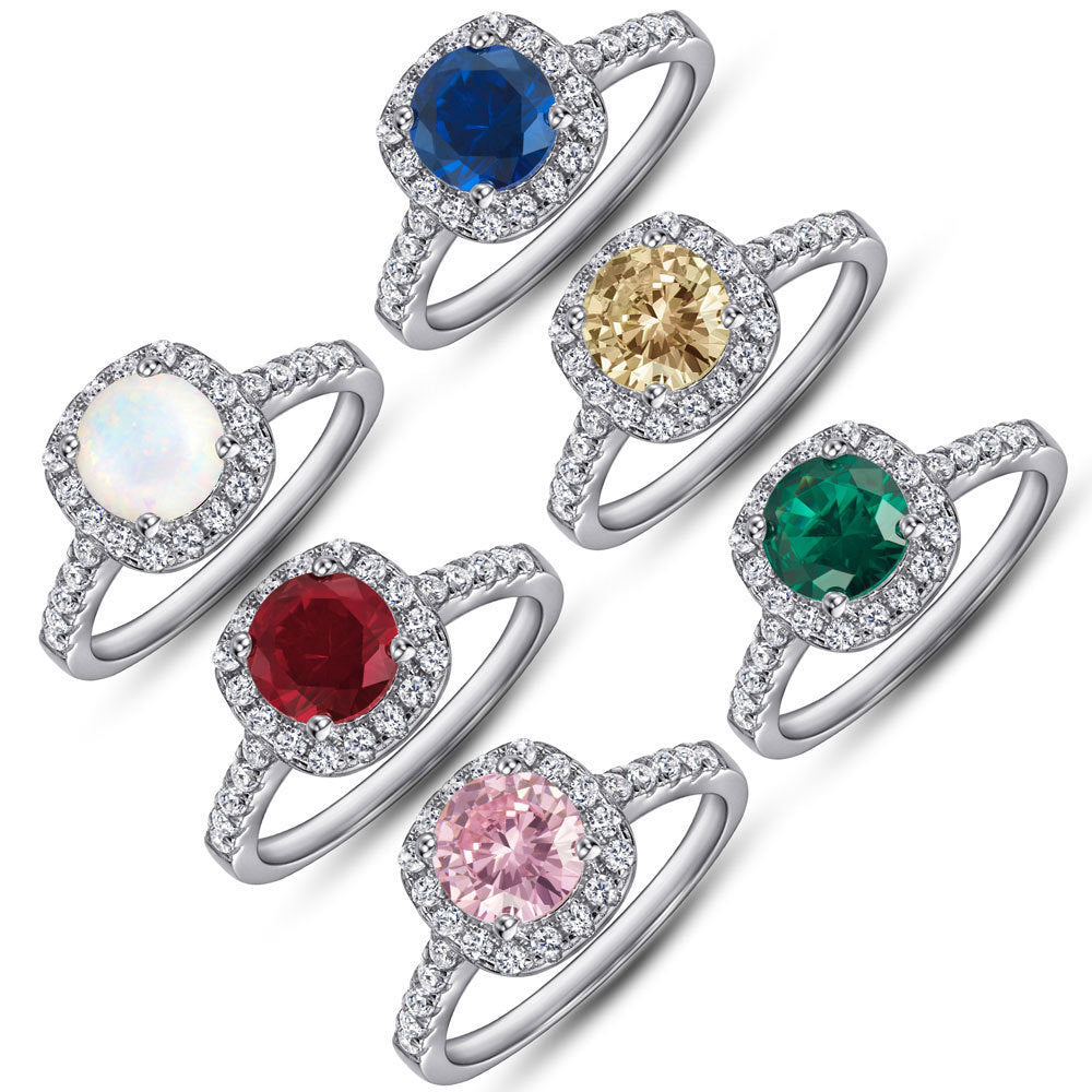 Damen Ring mit funkelndem pinkem Hauptstein und eleganten Zirkonia-Details Shop Nory