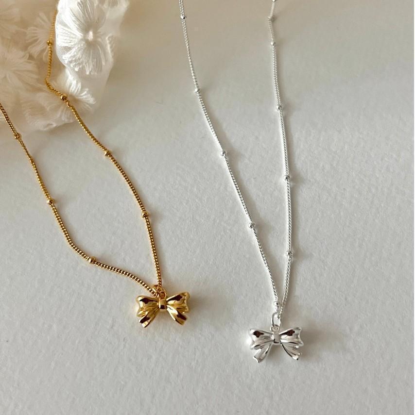 Damen Halskette mit elegantem Schleifenanhänger aus hochwertigem Edelstahl Shop Nory