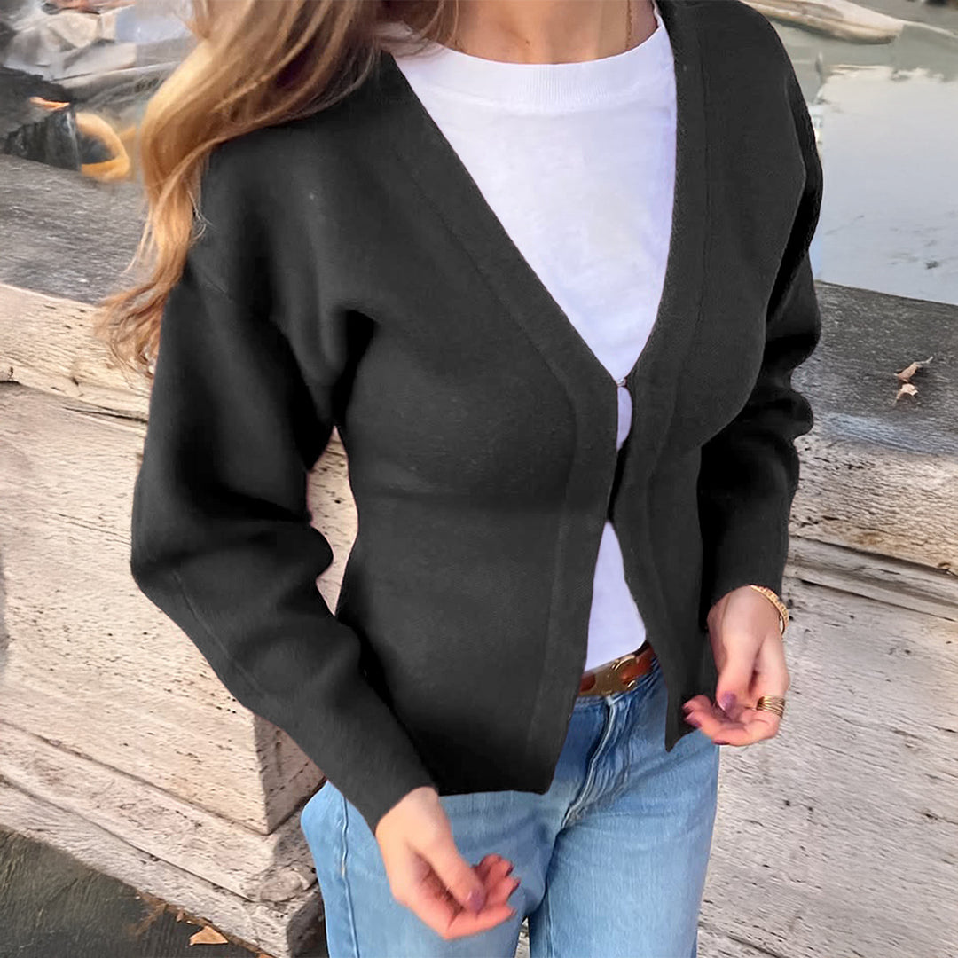 Damen nan taillierte Strickjacke mit V-Ausschnitt, Puffärmeln und seitlichen Schlitzen Shop Nory