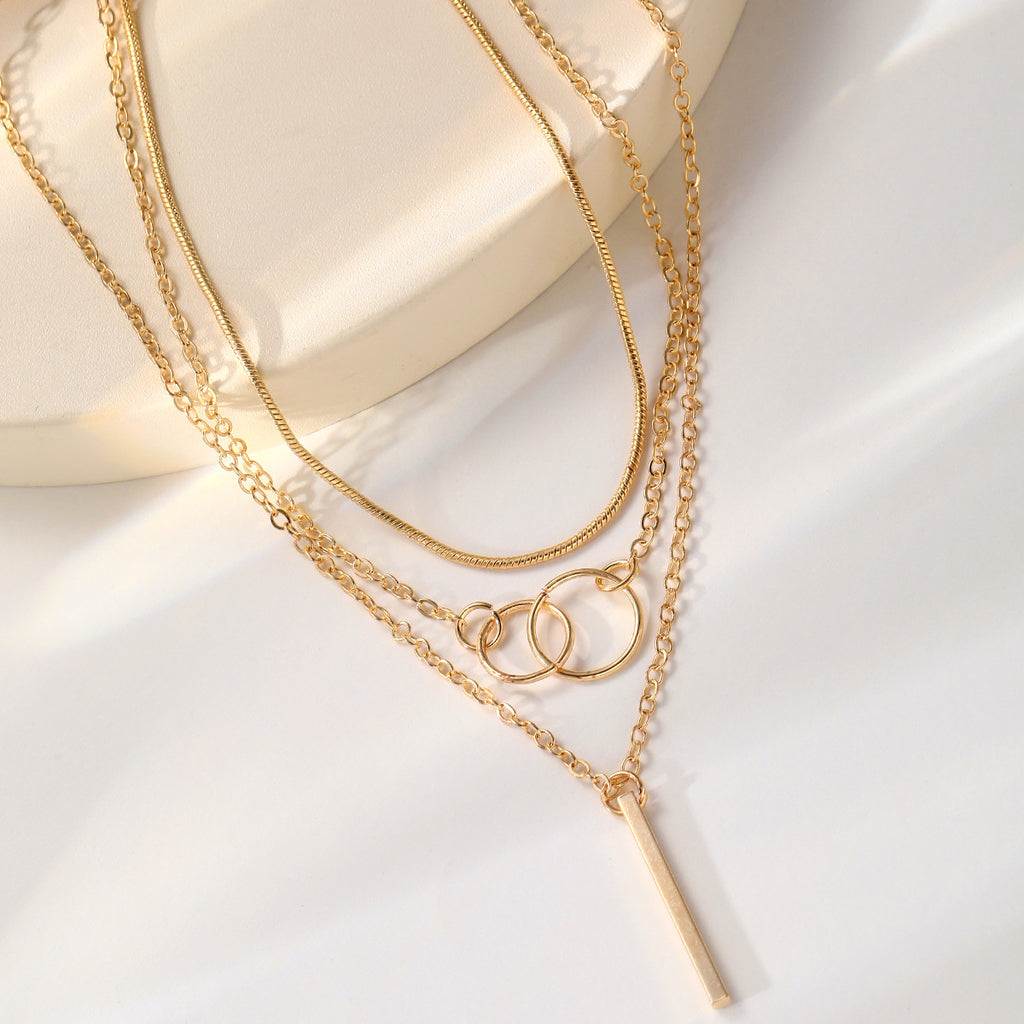 Damen mehrlagige Halskette mit runden Anhängern und elegantem Stangenakzent Shop Nory
