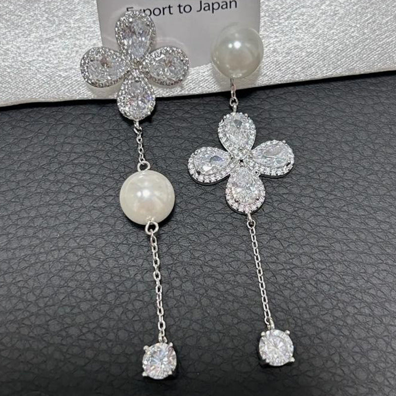 Damen Ohrhänger mit floralem Design, funkelnden Zirkonia und Perlenakzenten Shop Nory