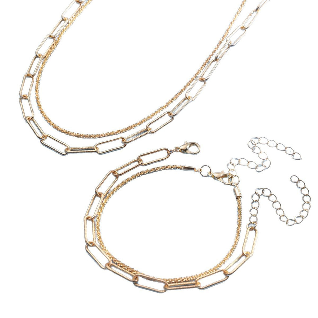 Damen Halskette und Armband Set mit modernen Glieder- und Zirkonia-Details Shop Nory