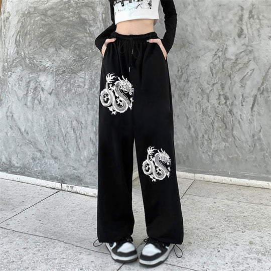 Damen nan weite Jogginghose hochgeschnitten mit seitlichem Statementprint und elastischem Bund Shop Nory