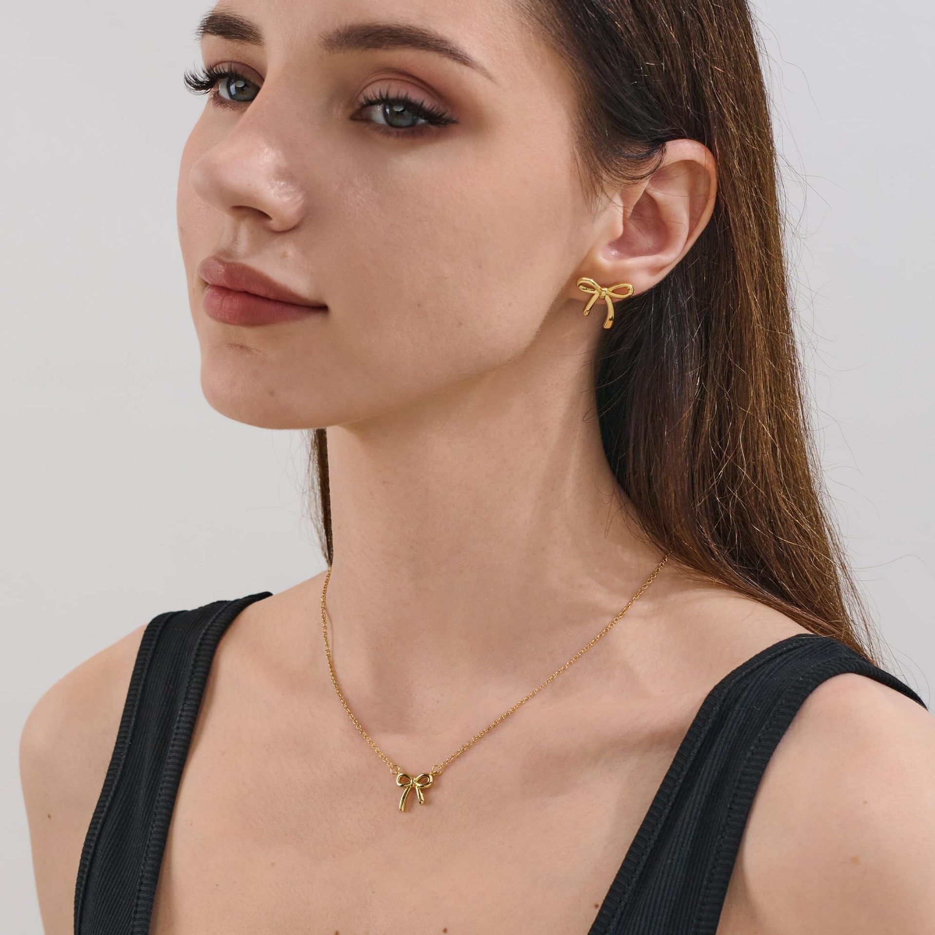 Damen Halskette mit elegantem Schleifenanhänger und robustem Kettendesign Shop Nory