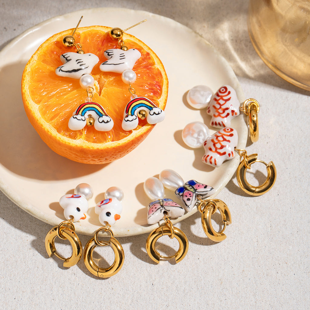 Damen Ohrhänger im verspielten Enten-Design mit Perlenschmuck und hypoallergener Edelstahlverarbeitung Shop Nory