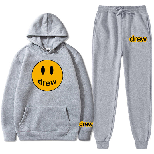 Unisex nan zweiteiliges Lounge-Set aus French-Terry mit Smiley-Print Kapuzenpullover und tapered Jogginghose Shop Nory
