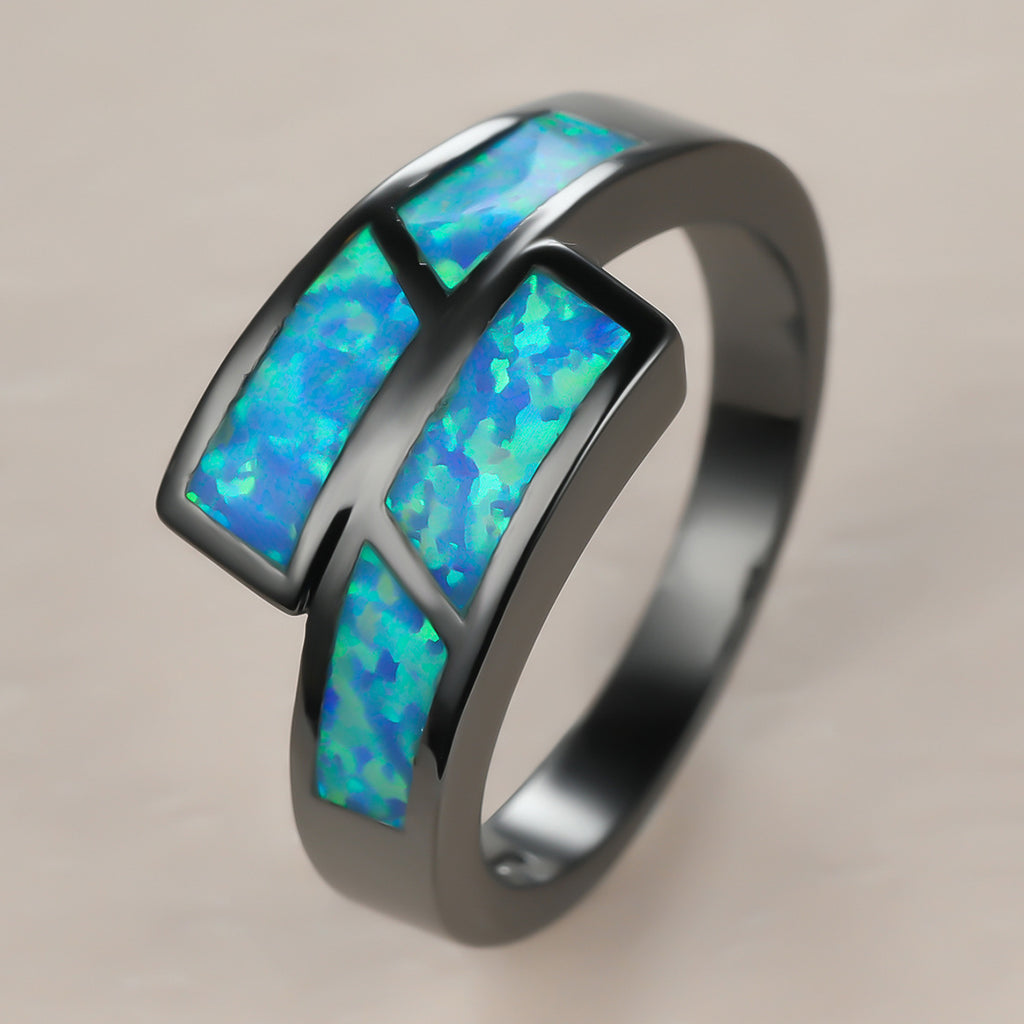 Damen Ring mit modernem, geometrischem Design und schimmernden Opal-Elementen Shop Nory