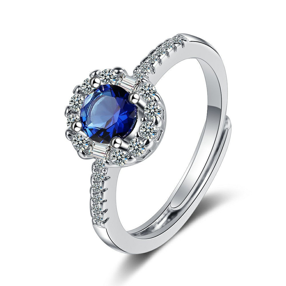 Damen Funkelnder Cocktailring mit blauen Zirkonia und detailreicher Fassung Shop Nory