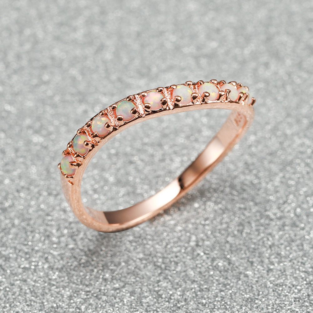 Damen Ring mit funkelnden opalisierenden Steinen Shop Nory