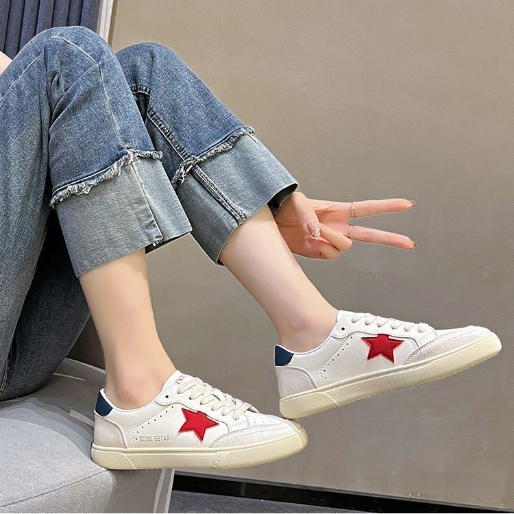 Damen Sneaker mit funkelnden Stern-Applikationen und atmungsaktiver Struktur