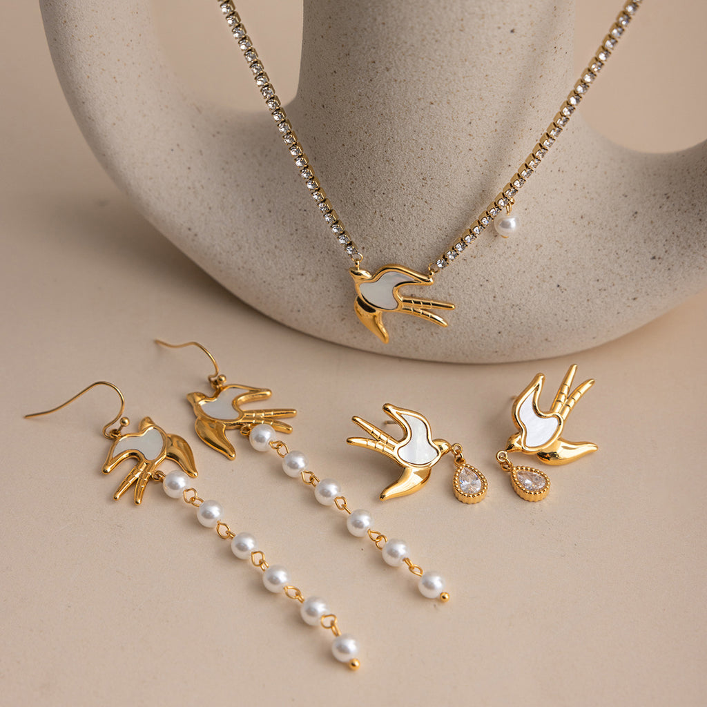 Damen Ohrhänger im eleganten Vogel-Design mit funkelndem Kristallanhänger Shop Nory