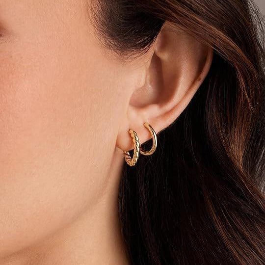 Damen Ohrringe mit funkelnden Zirkonia-Akzenten und modernem Design Shop Nory