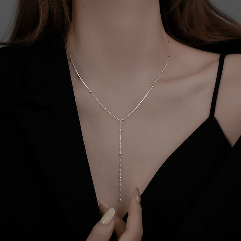 Damen zarte Halskette mit funkelnden Zirkonkugeln Shop Nory