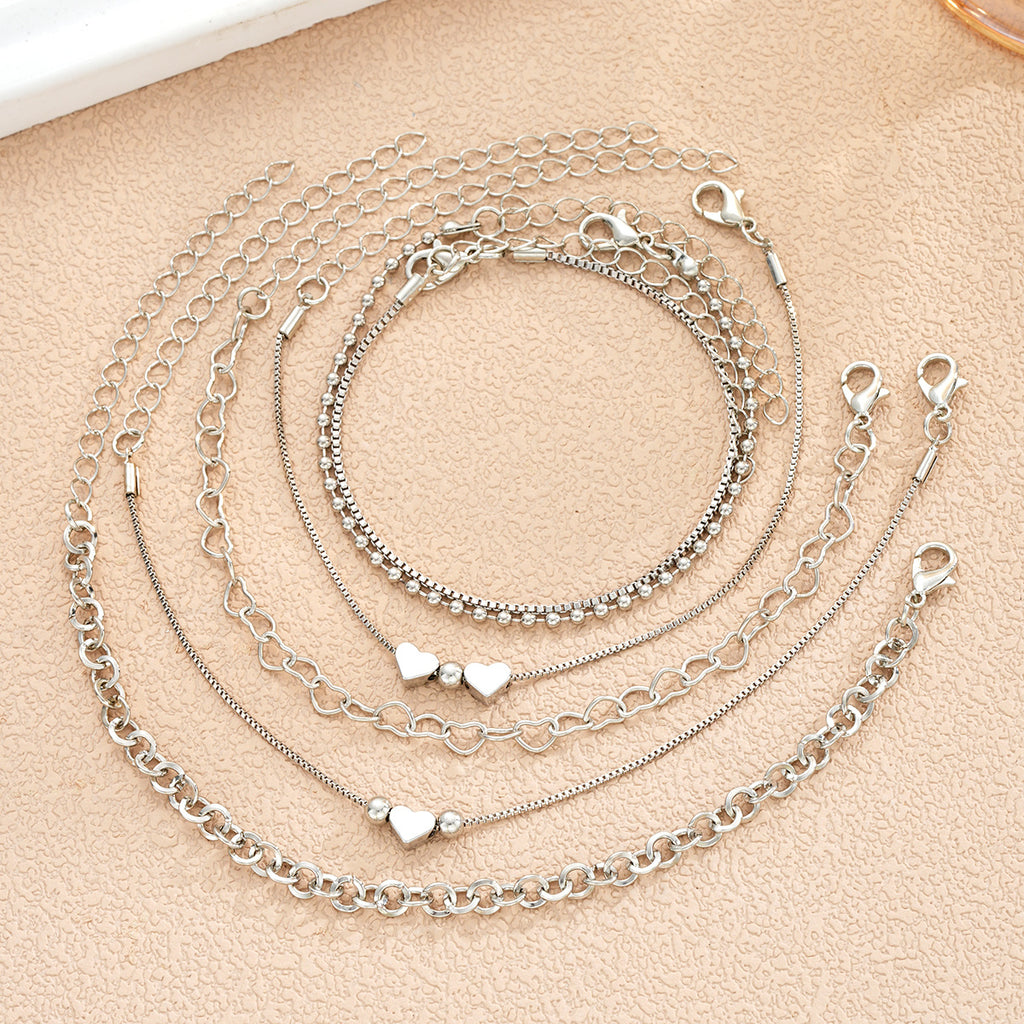 Damen Armband-Set mit filigranen Herzmotiv und funkelnden Akzenten Shop Nory