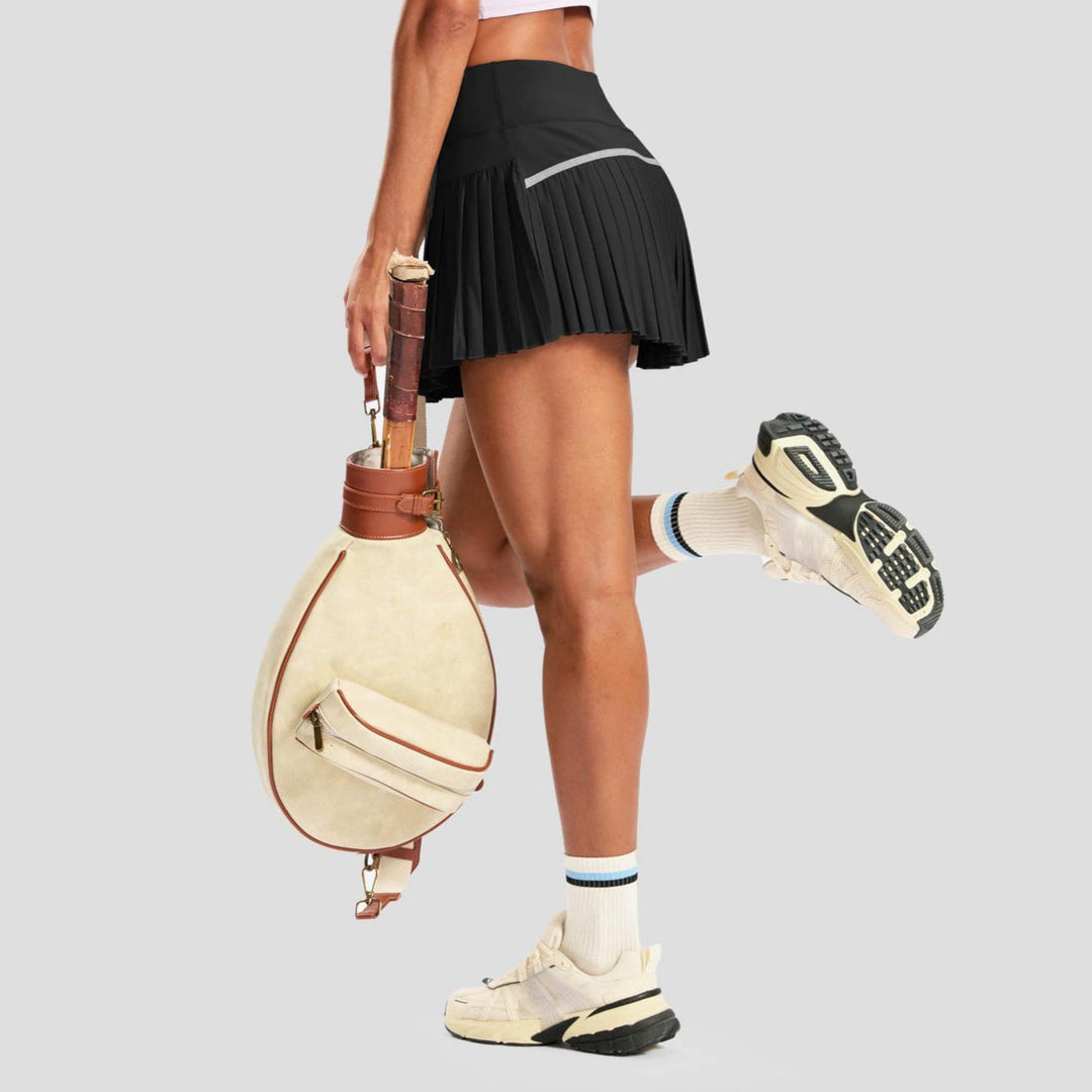 Damen Sportlicher Plisseerock mit integrierten Shorts