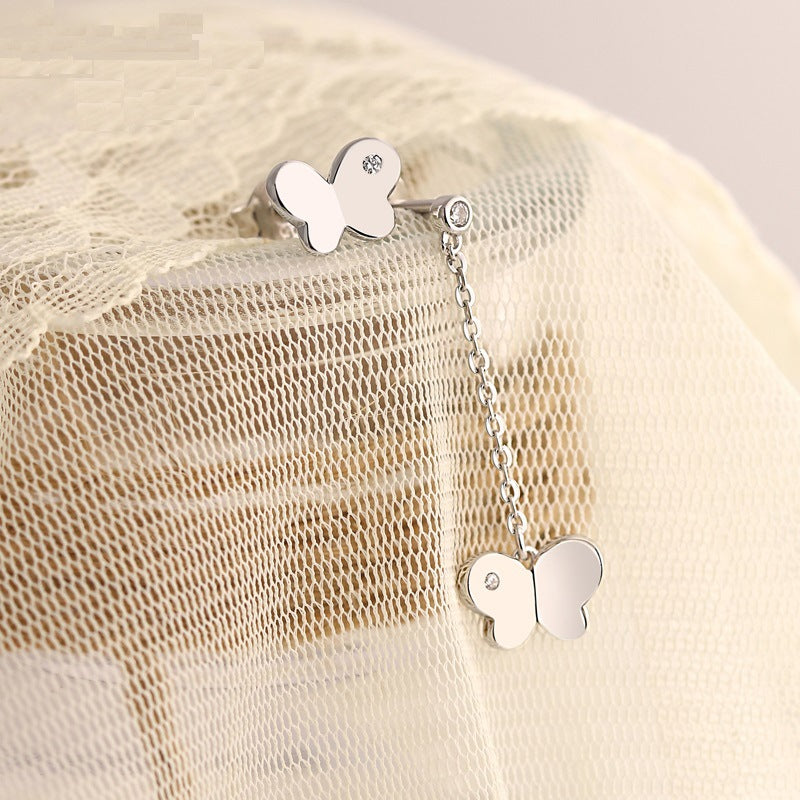 Damenohrringe mit filigranem Schmetterlingsdesign und funkelndem Zirkonia-Besatz Shop Nory