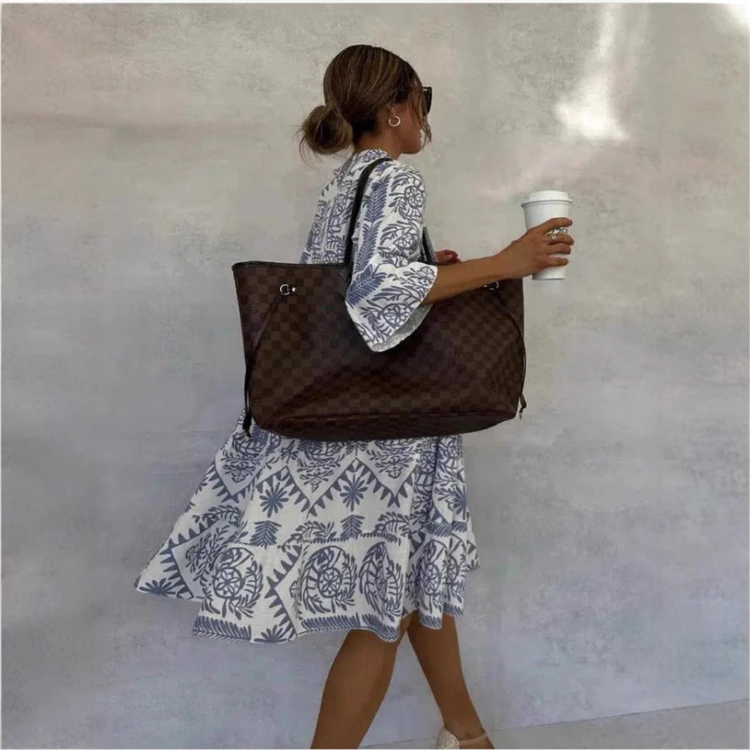 Damen Tunika-Kleid mit floralem Design und lockerer Passform